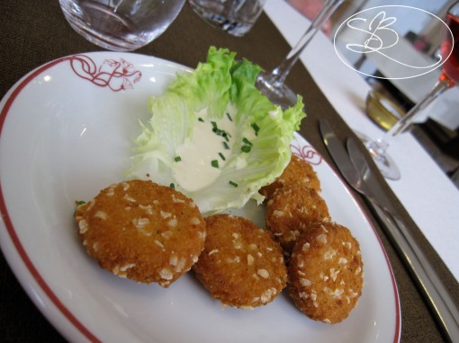 Medallions of camembert battered and fried